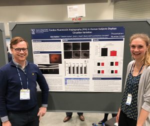 A photograph of Dr. Alan Hopkins and Dr. Natalie Hudson presenting at ARVO 2019